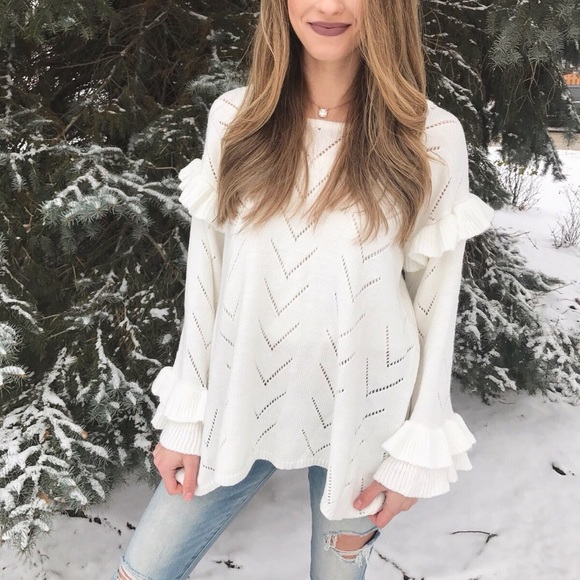 Sweaters - White ruffle sweater.